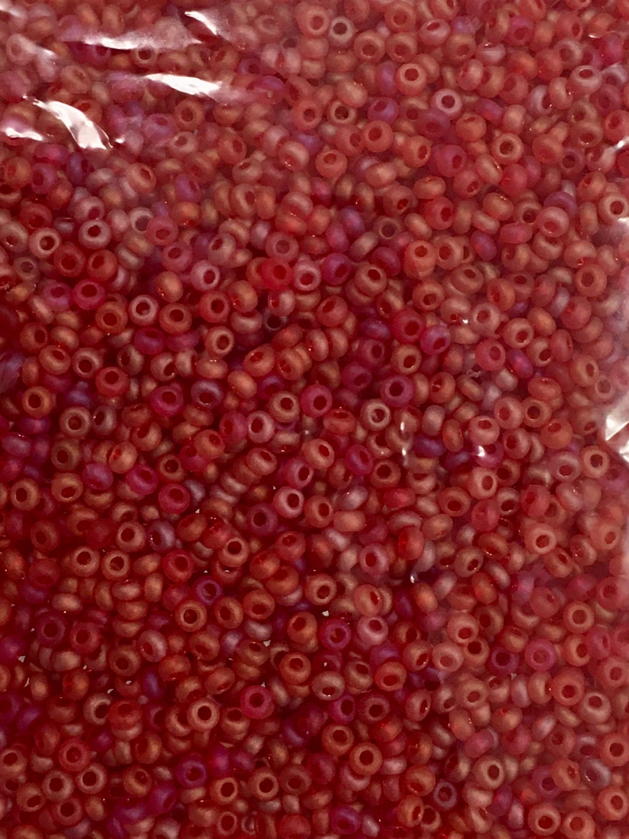 Matte size 10/0 - Transparent Lt Red Assorted Beads